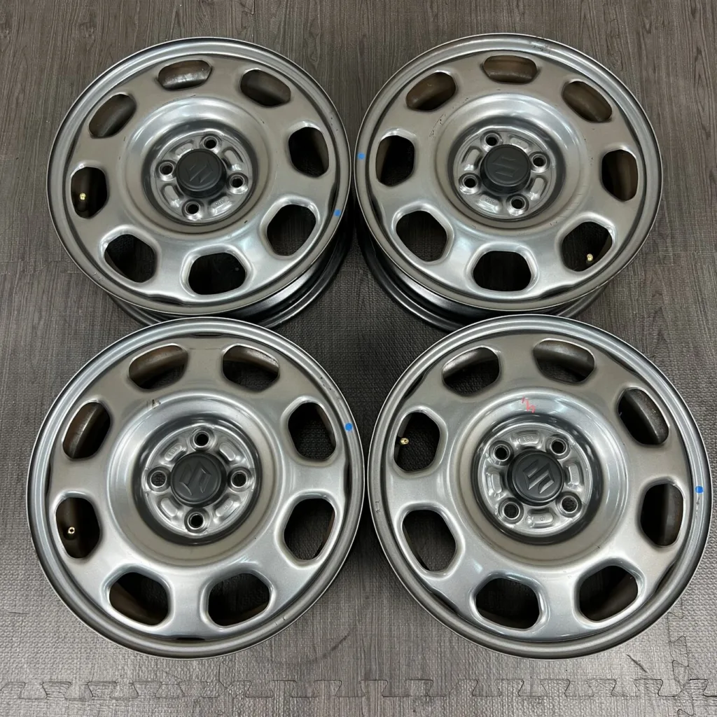 中古 スズキ HUSTLER ホイール 15×4.5J PCD 4x100 ET45 #0377AD000926の実物写真（1枚目）