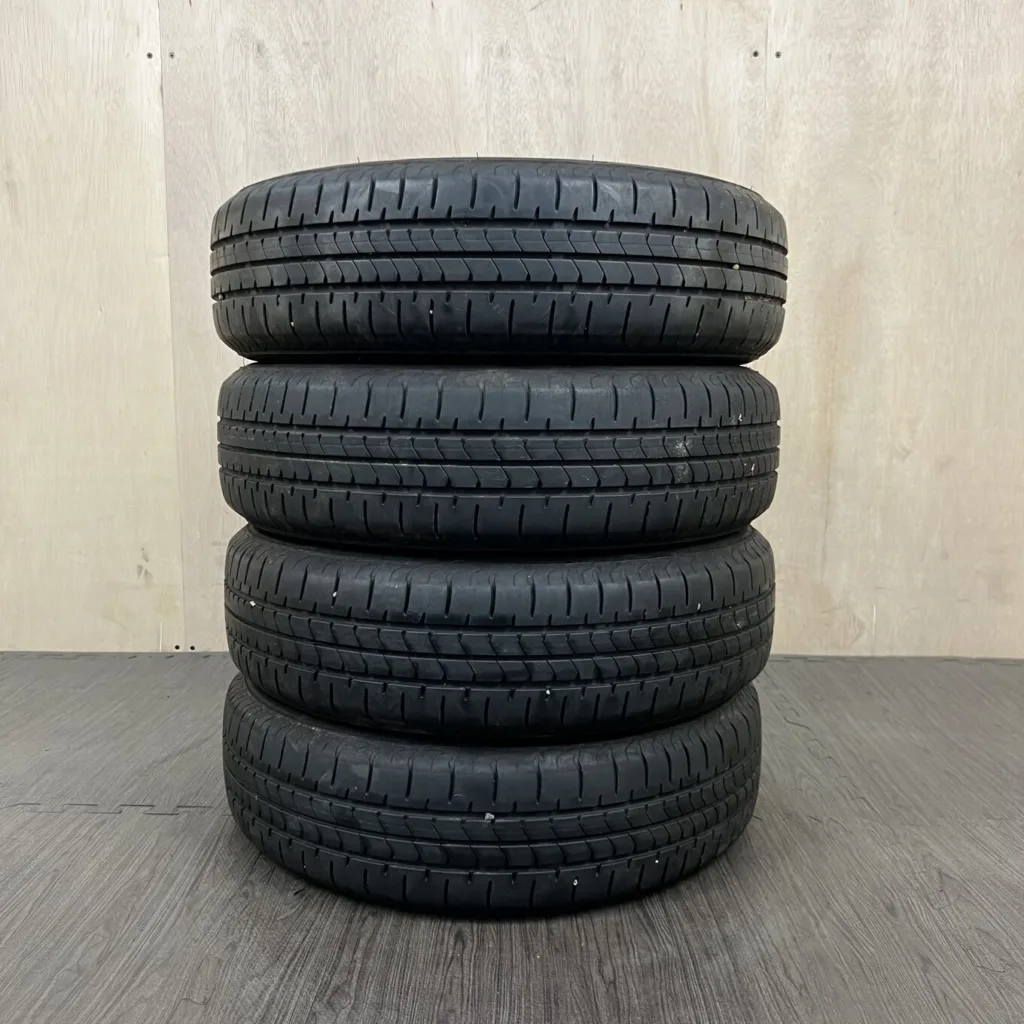 中古 BRIDGESTONE NEWNO サマータイヤ 155/65R14 #0402AT000926の実物写真（1枚目）