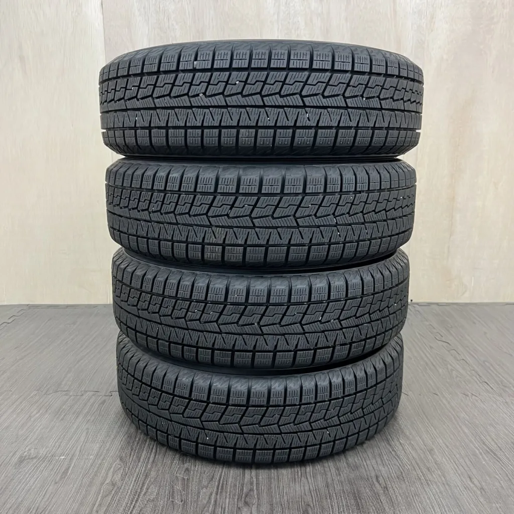 中古 YOKOHAMA ICE GUARD IG60 冬用タイヤ 155/65R14 #82T40426の実物写真（1枚目）
