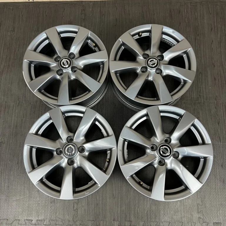 中古 日産 ホイール 15×5.5J PCD 4x100 ET40 #0100AD020926の実物写真（1枚目）