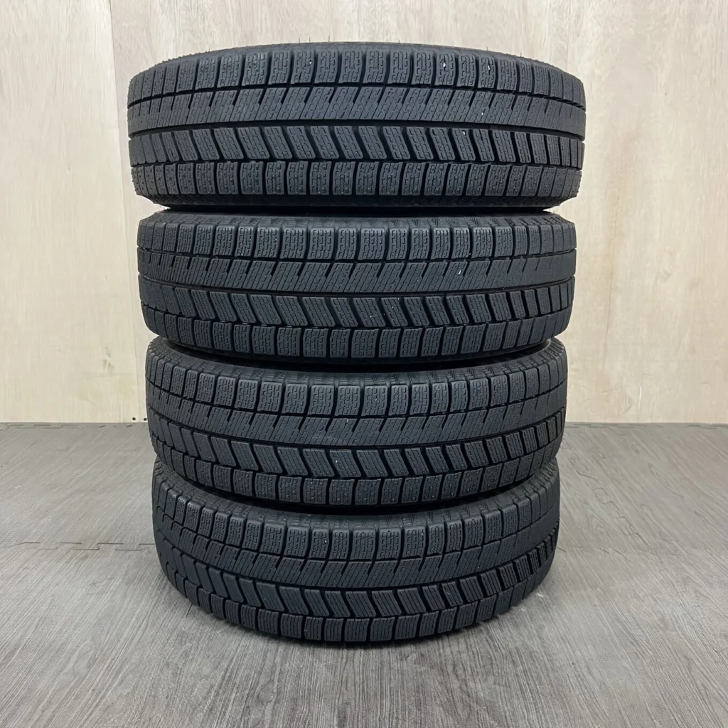 中古 BRIDGESTONE BLIZZAK WZ-1 冬用タイヤ 155/65R14 #0018AT010926の実物写真（1枚目）