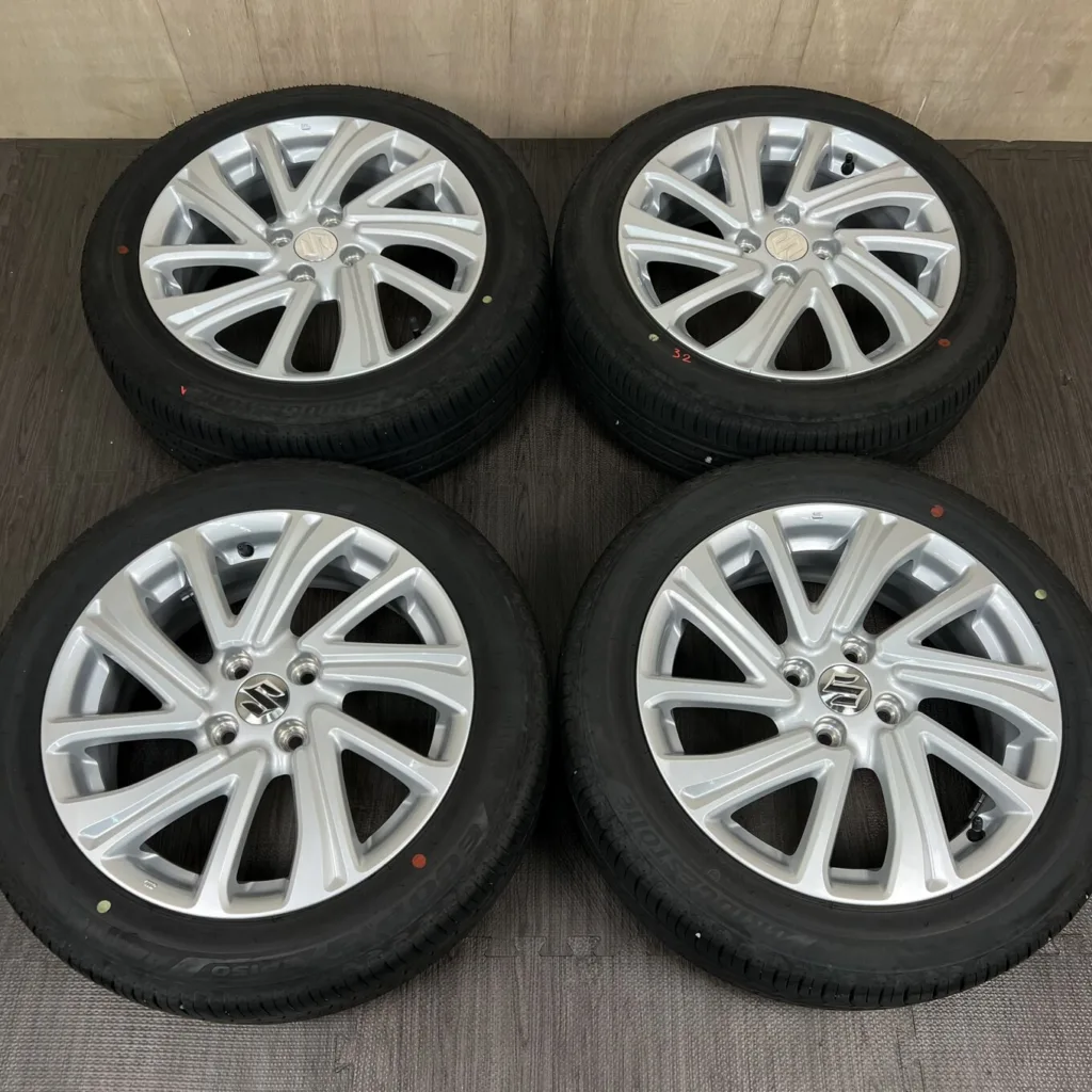 中古 スズキ SWIFT ホイール 16×6.0J PCD 4x100 ET45 #32D40426の実物写真（1枚目）