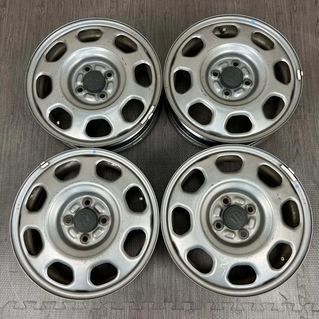 中古 スズキ HUSTLER ホイール 15×4.5J PCD 4x100 ET45 #0376AD000926の実物写真（1枚目）