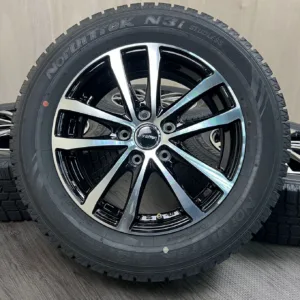 中古 AUTOBACS NORTHTREK N3I + AUTOBACS E:VANCE HA1 タイヤ・ホイールセット 215/60R16 · 16×6.5J PCD 5x114.3 ET50 #292S40925の実物写真(1枚目)